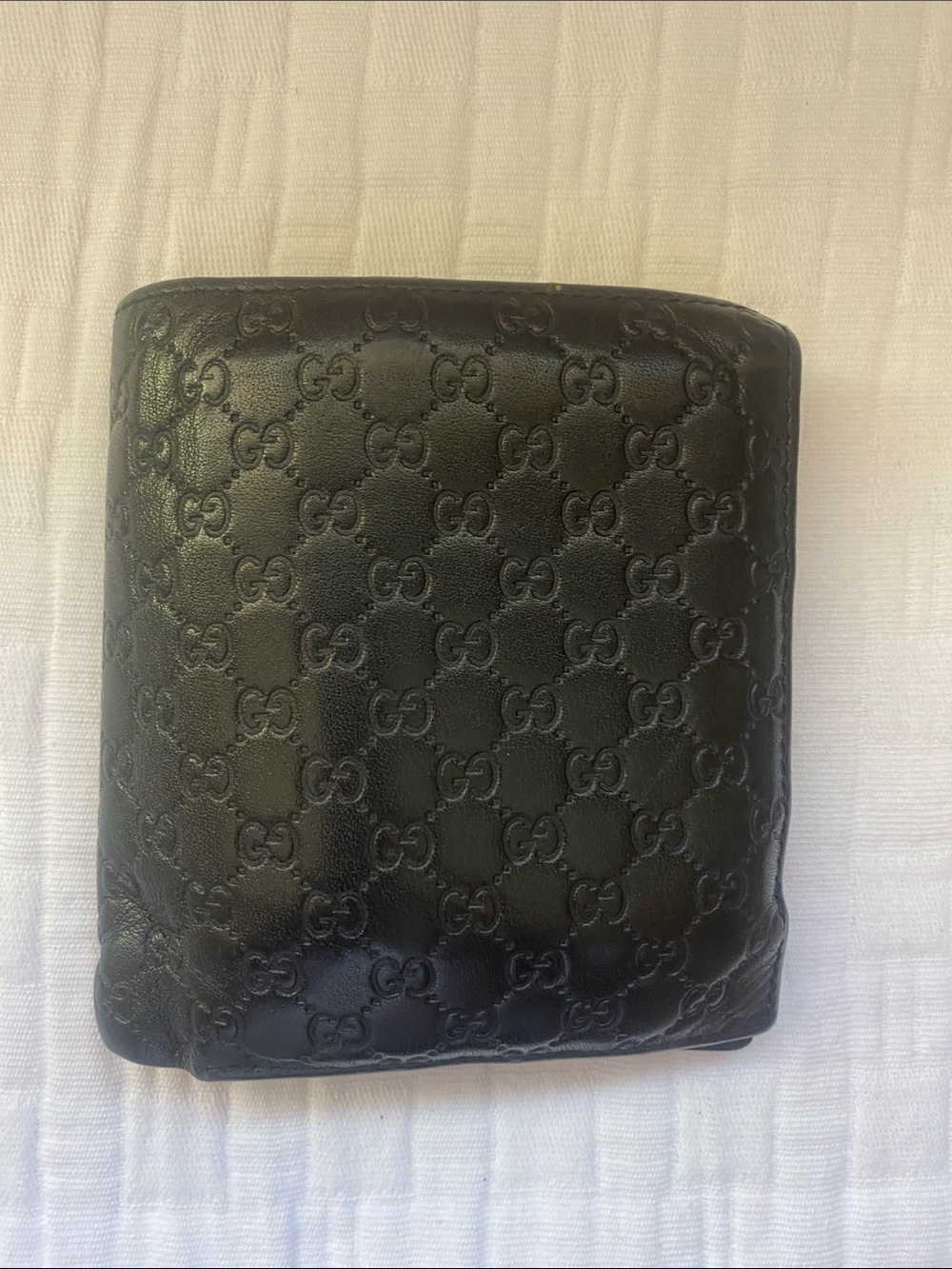 Gucci Dark Brown GG Embossed Leather Bi-Fold Wallet